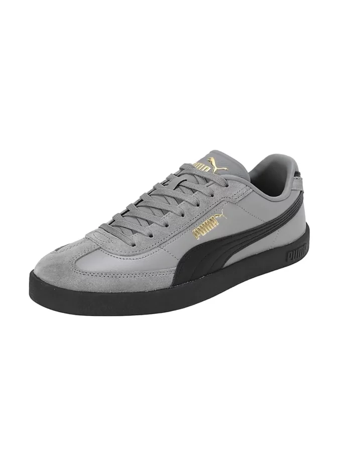 zapatillas puma club II era de color gris, negro y dorado