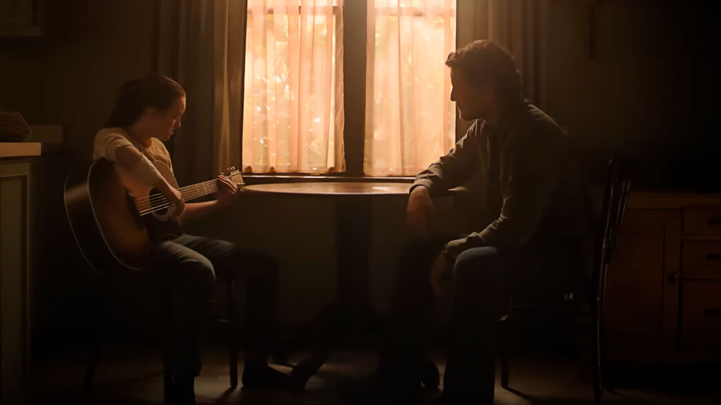 Escena de la serie The Last of Us temporada 2 Ellie tocando la guitarra a Joel Miller