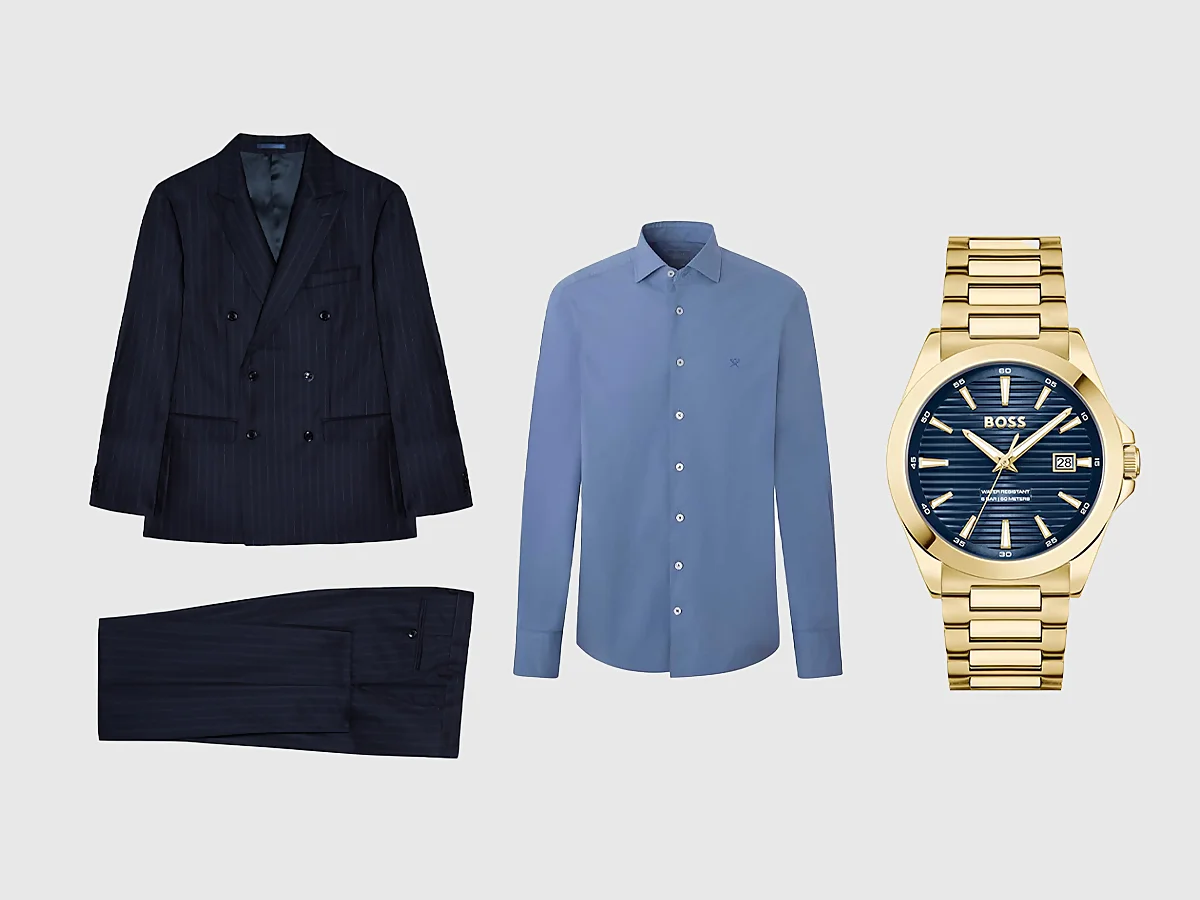 Traje con raya diplomática, camisa azul y reloj dorado