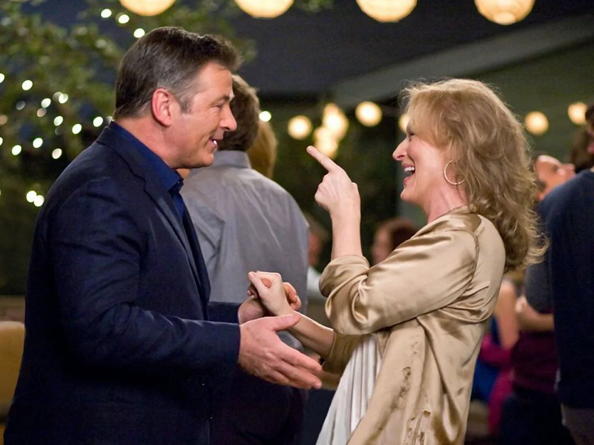 Meryl Streep y Alec Baldwin bailando