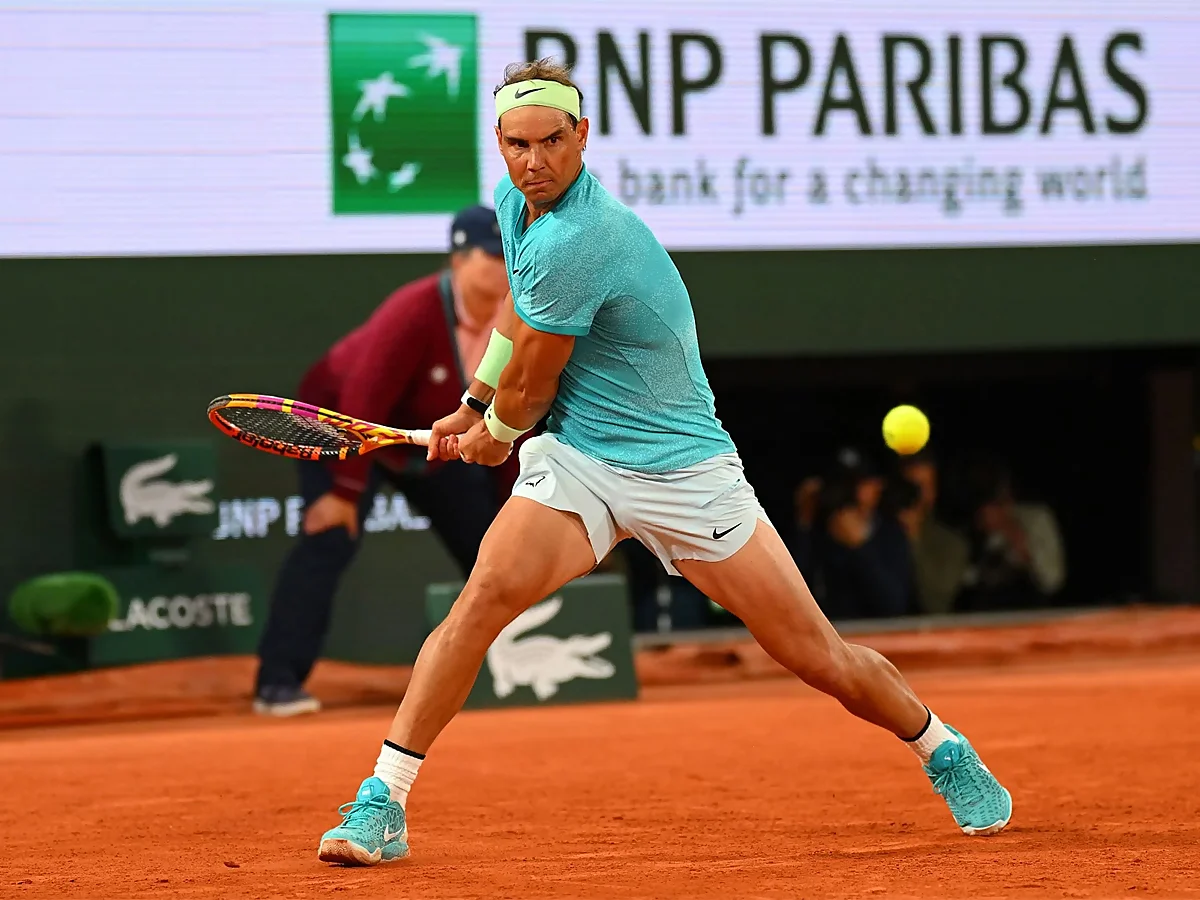 Rafa Nadal con camiseta verde de tenis en French Open 2024