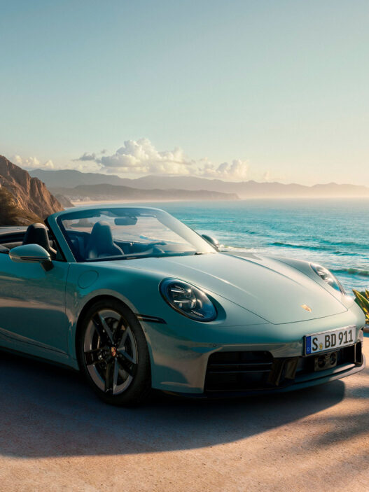 Porsche 911 descapotable azul 2025