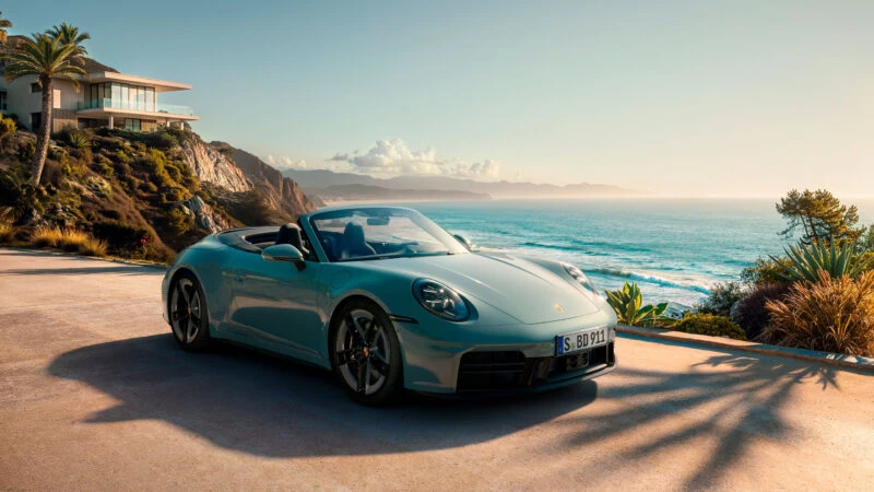 Porsche 911 descapotable azul 2025