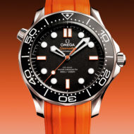 El OMEGA Seamaster Diver 300M llega con una versión en naranja para los amantes del buceo Reloj OMEGA Seamaster Diver 300M con correa de caucho naranja y esfera negra con detalles en naranja.