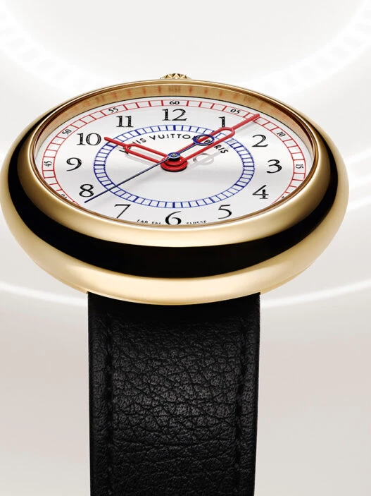 Reloj Louis Vuitton Monterey con caja de oro amarillo y esfera esmaltada Grand Feu blanca.