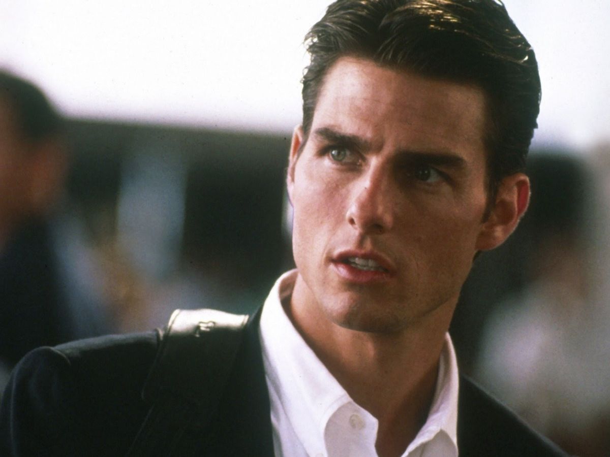 Tom Cruise interpretando a Jerry Maguire