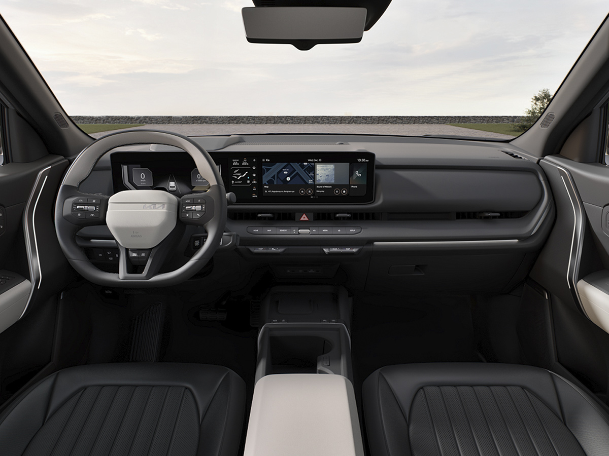 Interior del Kia Seltos 2025 con doble pantalla de 12,3 pulgadas y consola central despejada