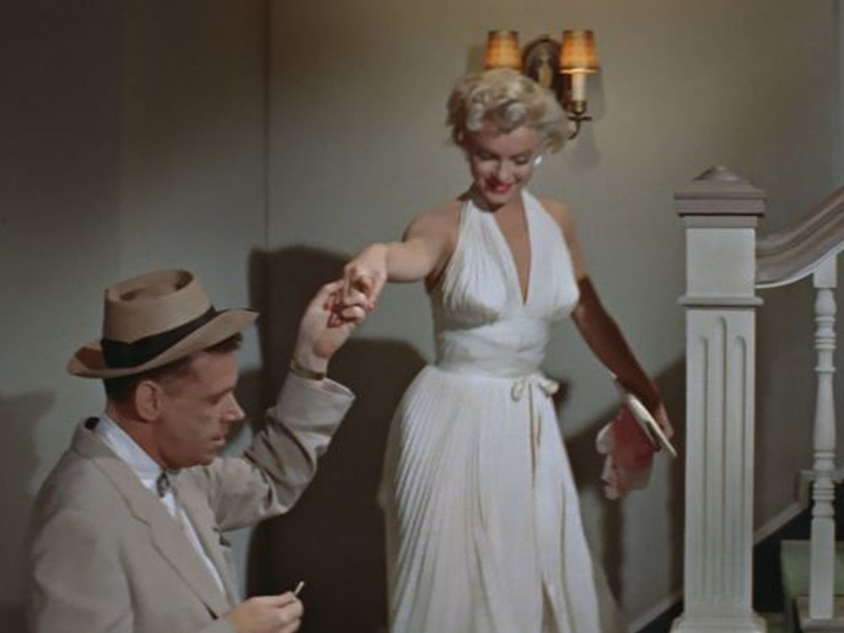 Escena icónica de La tentación vive arriba que simboliza el momento de decisión emocional en una relación