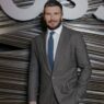 El futbolista David Beckham acudió como invitado al desfile de la firma Boss celebrado ayer, 26 de febrero en Milán.
