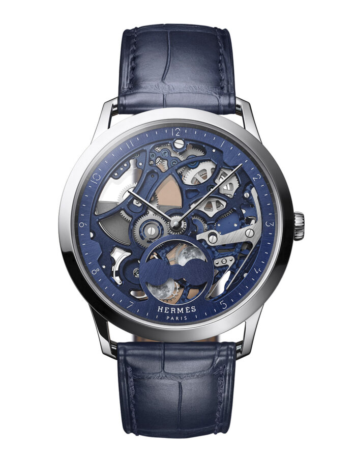 Reloj Hermès Slim d’Hermès Squelette Lune con esfera calada azul.