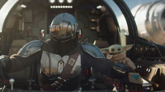Mando y Grogu a bordo de una nave espacial en una escena del tráiler de The Mandalorian and Grogu.