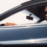 Michael Jordan conduciendo coche lujo