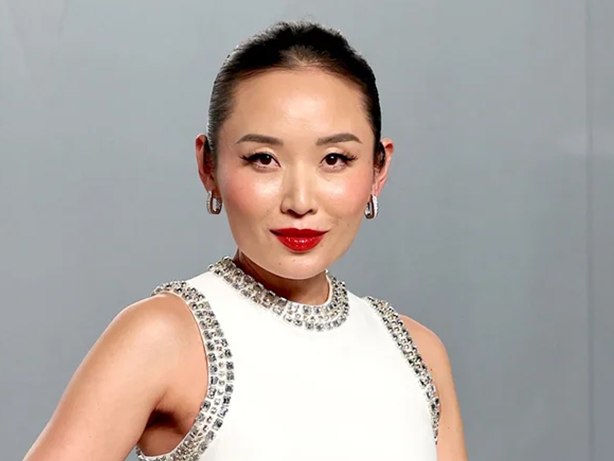 actriz Li Jun Li vestida de blanco muy elegante