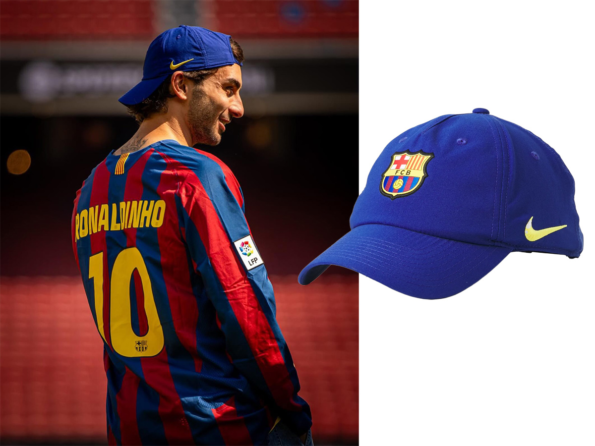 Ferran Torres con gorra nike azul con logo amarillo