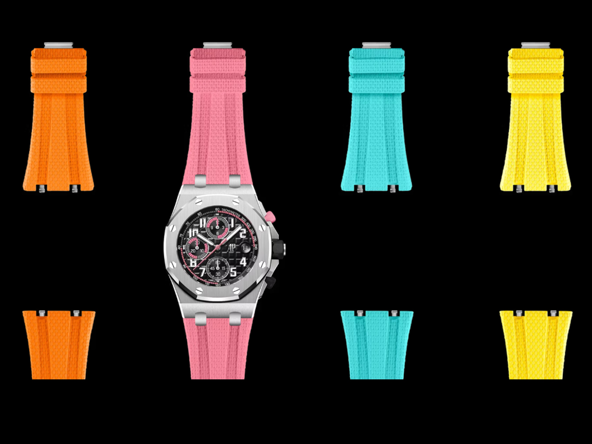 Audemars Piguet Royal Oak Offshore Chronograph con correa de caucho rosa junto a las correas intercambiables en naranja, turquesa y amarillo.