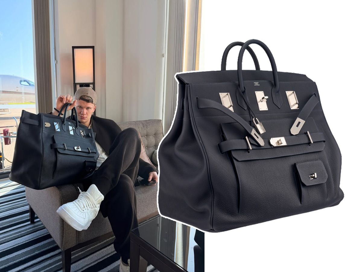 Erling Haaland sentado en una sala VIP junto a su bolso Hermès Birkin HAC 50 negro de edición limitada en piel Togo con bolsillo exterior