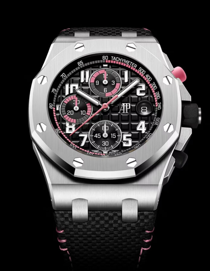 Audemars Piguet Royal Oak Offshore Selfwinding Chronograph de acero con esfera negra Méga Tapisserie, acentos rosas y correa de piel negra con pespunte rosa.