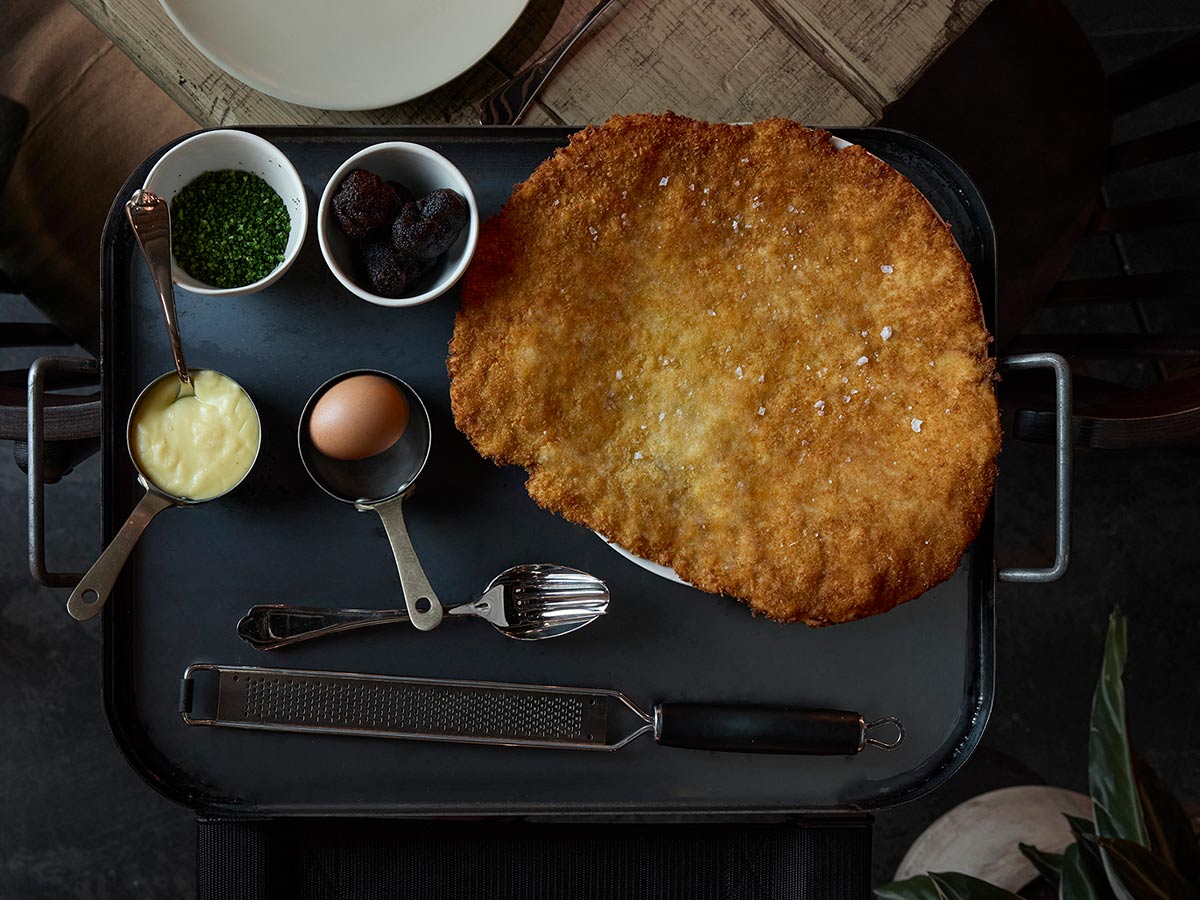 Fismuler plato escalope San Román con huevo y trufa