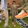Varios modelos con bolsos Speedy y zapatillas Louis Vuitton LV Drop 300 en el desfile masculino otoño-invierno 2026 de Pharrell Williams