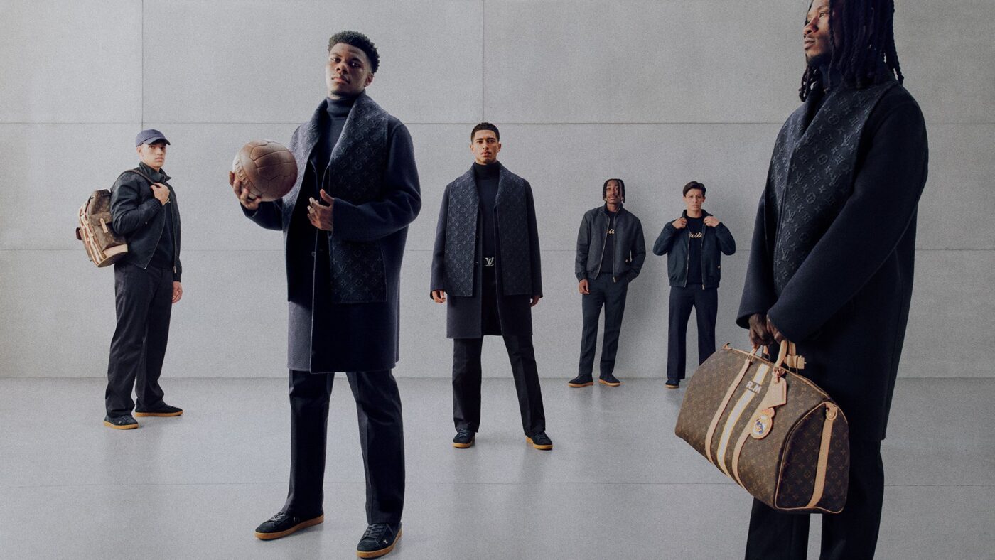 Carlos Espí, Aurélien Tchouaméni, Jude Bellingham, Yan Diomande, Arda Güler y Eduardo Camavinga con la colección Louis Vuitton x Real Madrid 2026-27